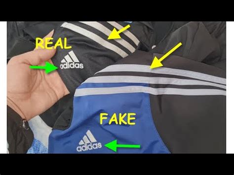 how to spot fake adidas tracksuit|adidas tracksuit counterfeit.